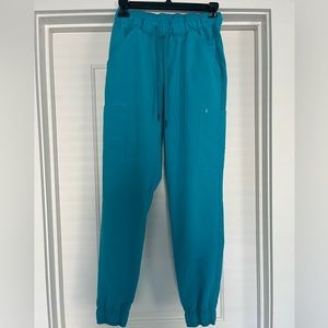 Jaanuu Scrub Pants: Mesh-enhanced Scrub Jogger, Teal size XS